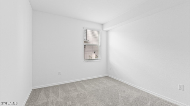 16556 Kingwood Ln Unit 34-101, Babcock Ranch, FL 33982 - spare room featuring light colored carpet