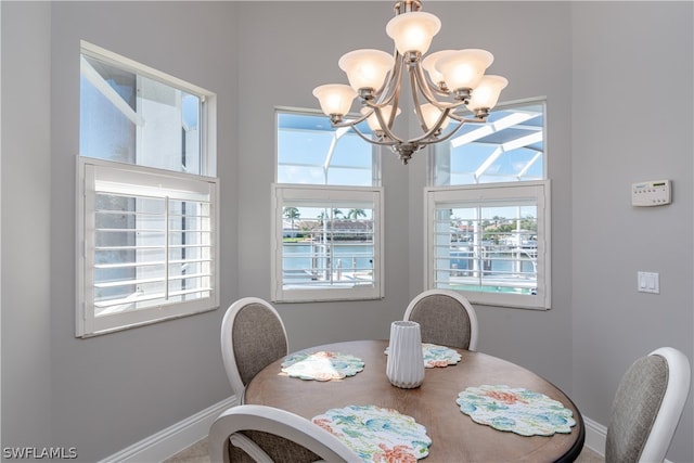 dining space featuring a chandelier