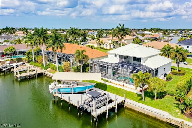 drone / aerial view with a water view