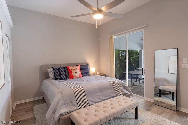 bedroom featuring light hardwood / wood-style floors, access to exterior, and ceiling fan