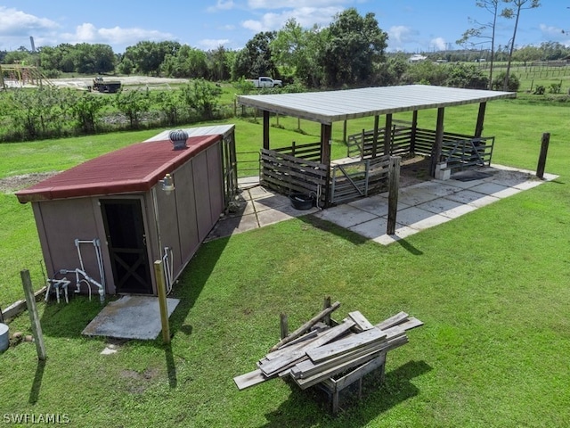 view of home's community with an outbuilding