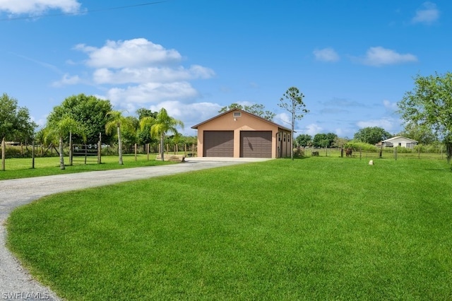 exterior space featuring a front lawn and a garage