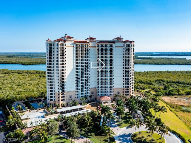 view of building exterior with a water view