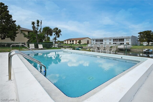 view of swimming pool featuring a patio