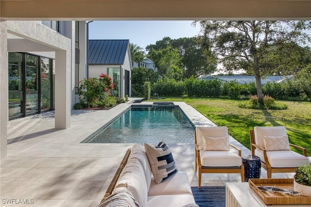 view of swimming pool featuring a fenced in pool, a patio, an outdoor hangout area, fence, and a yard