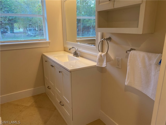 bathroom with tile flooring and oversized vanity