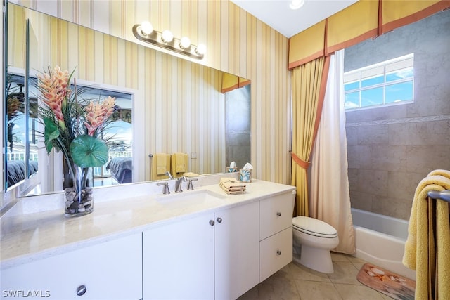 full bathroom featuring shower / bath combo, toilet, tile floors, and large vanity