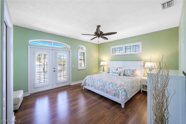 bedroom featuring french doors, ceiling fan, dark wood-type flooring, and access to exterior