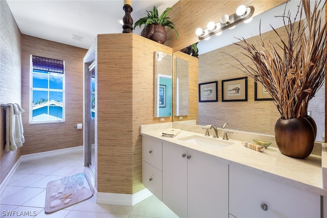 bathroom featuring vanity and tile flooring