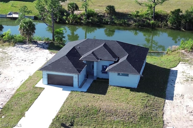 bird's eye view with a water view