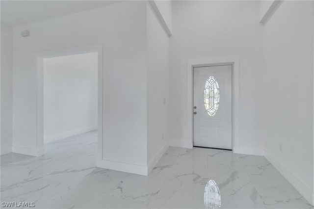 view of tiled foyer entrance