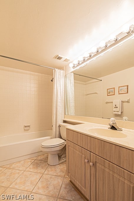 full bathroom with vanity, tile floors, toilet, and shower / bath combination with curtain