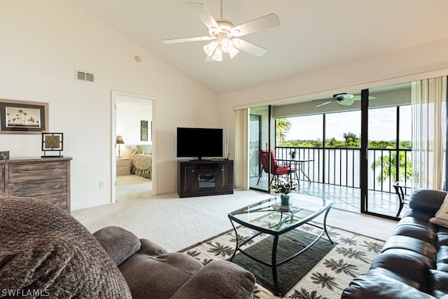 living room featuring ceiling fan, light colored carpet, and high vaulted ceiling