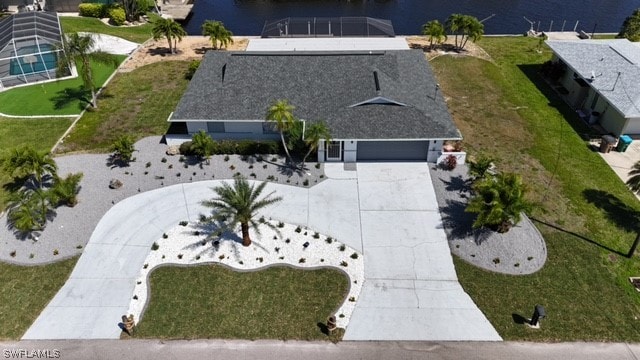 drone / aerial view with a water view