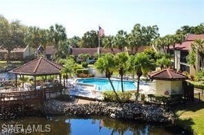 view of swimming pool with a gazebo