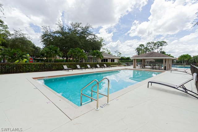 374 Dover Pl Unit 803, Naples, FL 34104 - pool featuring a patio, fence, and a gazebo