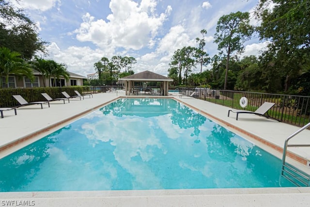 374 Dover Pl Unit 803, Naples, FL 34104 - view of pool featuring fence, a gazebo, and a patio area