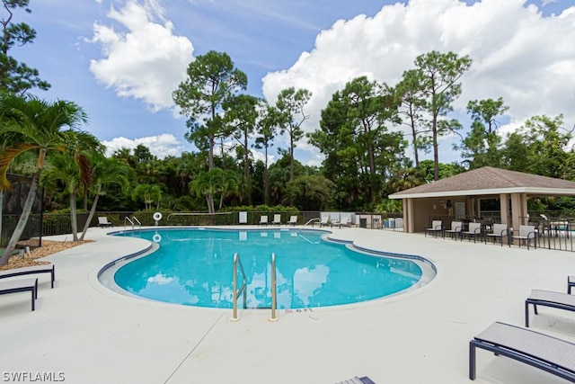 374 Dover Pl Unit 803, Naples, FL 34104 - pool with fence and a patio area
