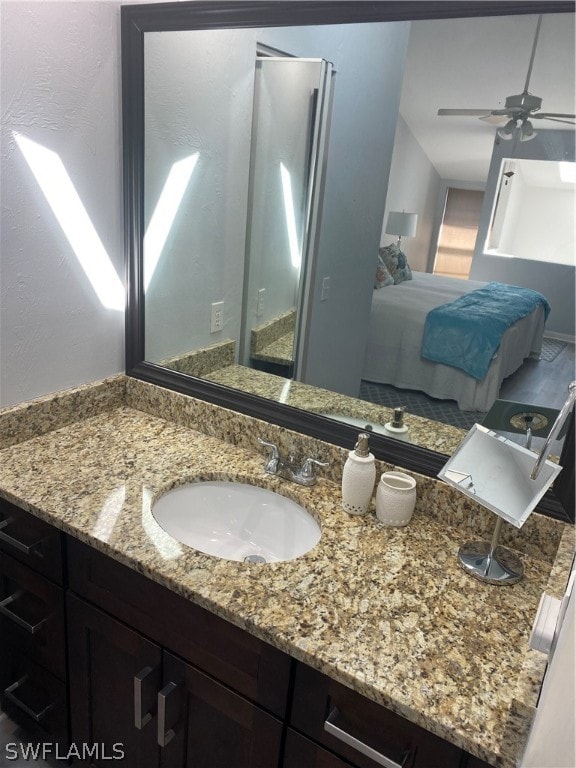 bathroom with vanity and ceiling fan