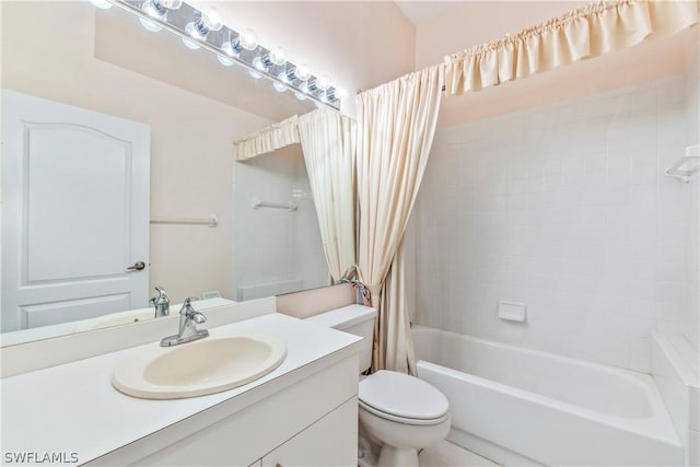 full bathroom featuring shower / bath combo, toilet, and vanity