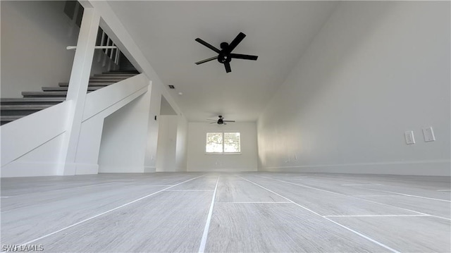 stairs with ceiling fan