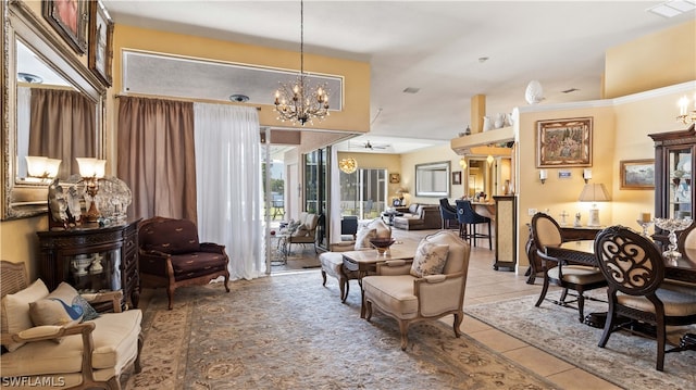 tiled living room with a notable chandelier