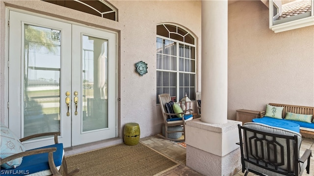 entrance to property featuring french doors