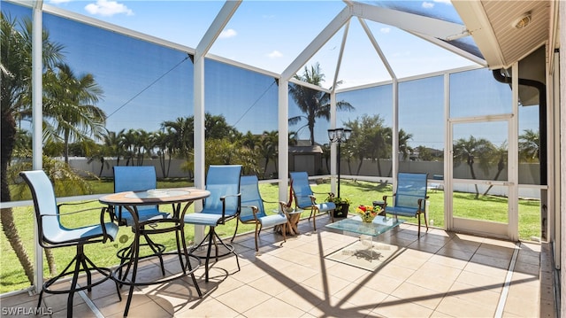 sunroom / solarium with lofted ceiling