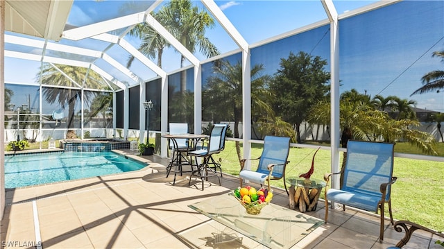 view of pool featuring a lanai, a lawn, and a patio