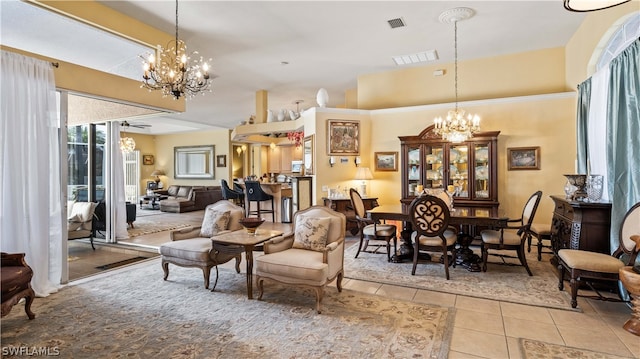 dining area featuring ceiling fan and light tile patterned flooring