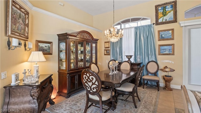 tiled dining space featuring a chandelier