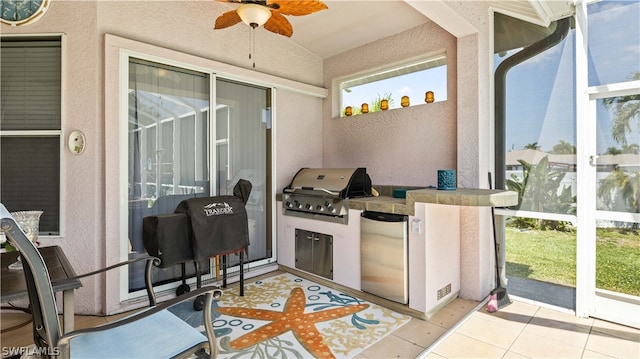 view of patio featuring ceiling fan and a grill