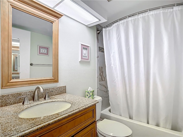 full bathroom featuring vanity, toilet, and shower / bathtub combination with curtain