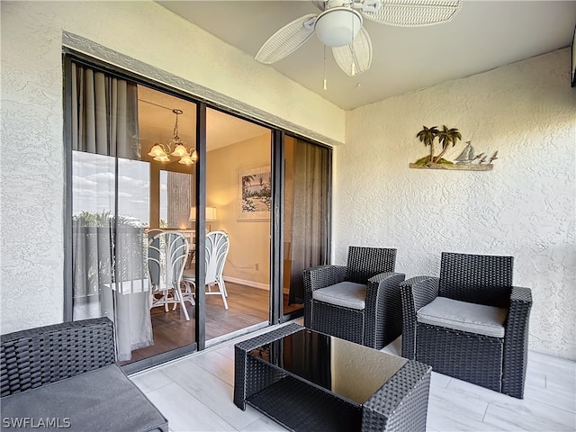 view of patio featuring ceiling fan