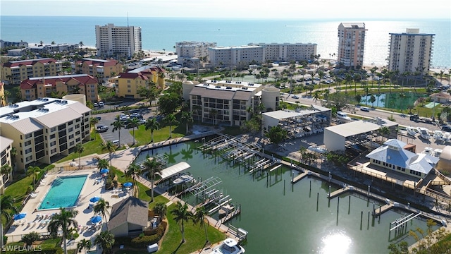 birds eye view of property featuring a water view