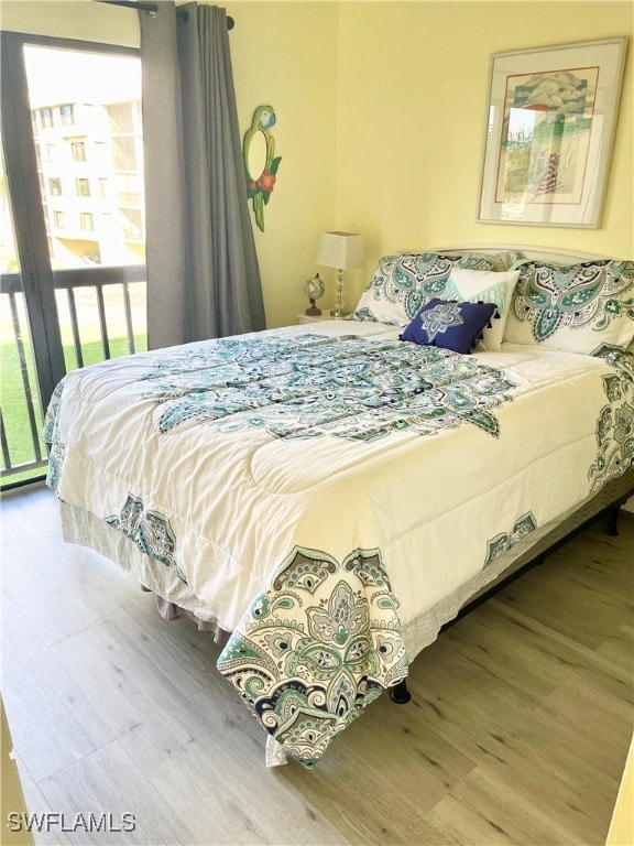 bedroom with wood-type flooring