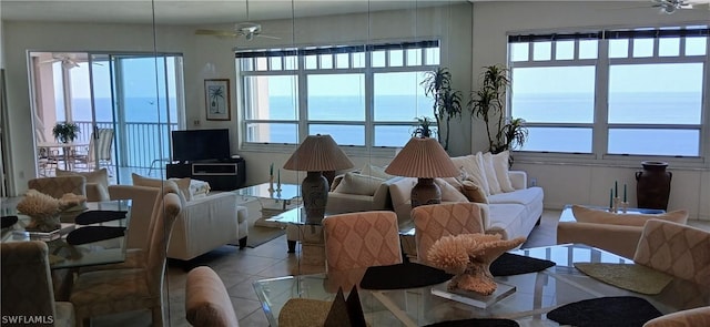 living room with light tile patterned floors and ceiling fan