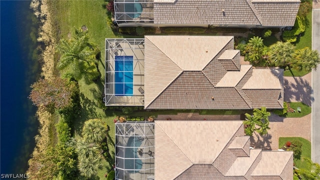 bird's eye view with a water view