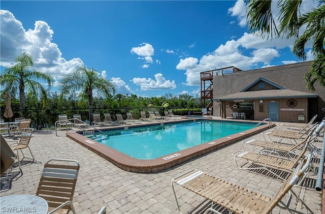 view of pool featuring a patio area