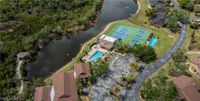 birds eye view of property featuring a water view