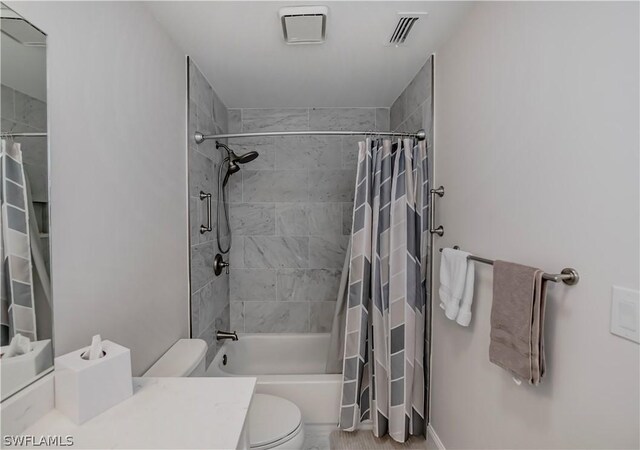 full bathroom featuring shower / bath combination with curtain, vanity, and toilet