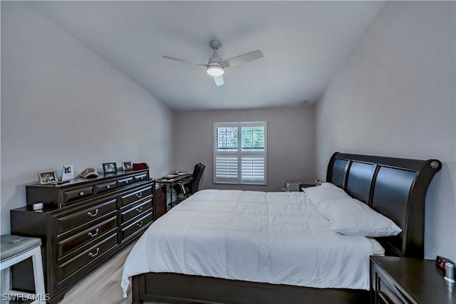 bedroom with ceiling fan and light hardwood / wood-style floors