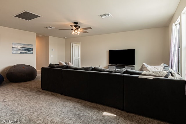 living room featuring light colored carpet and ceiling fan