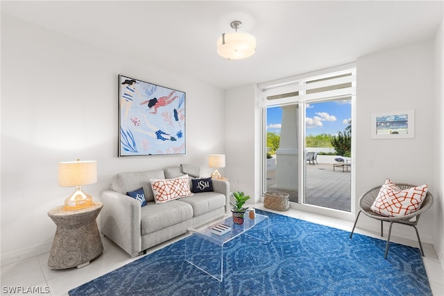 living room with tile patterned flooring