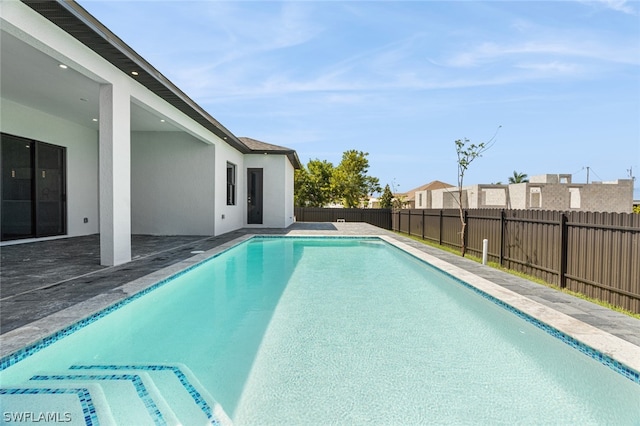 view of pool with a patio area