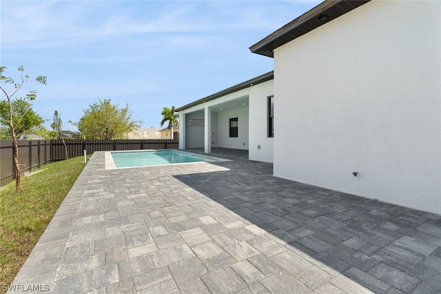 view of terrace featuring a fenced in pool