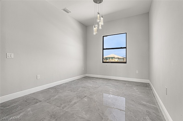 empty room with light tile flooring