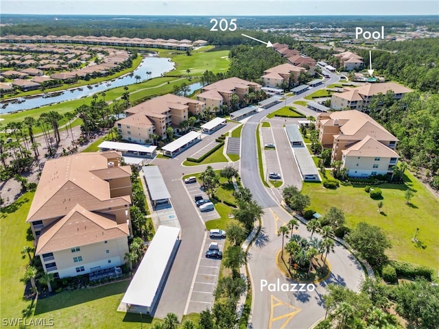 birds eye view of property featuring a water view