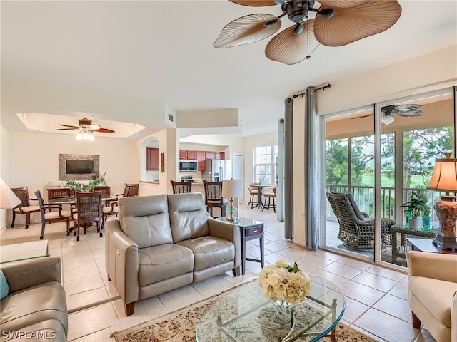 living room with light tile patterned flooring