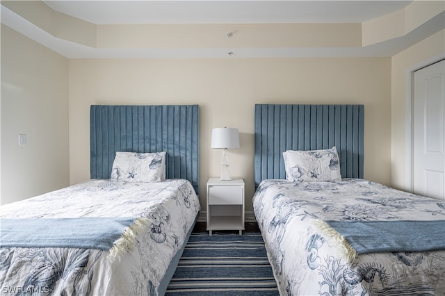 bedroom featuring a tray ceiling